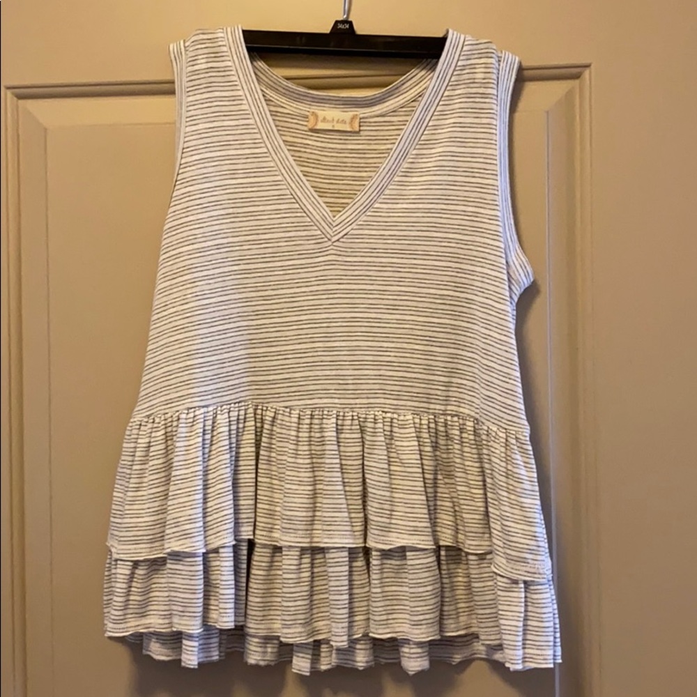 Sleeveless White and Gray Striped Shirt